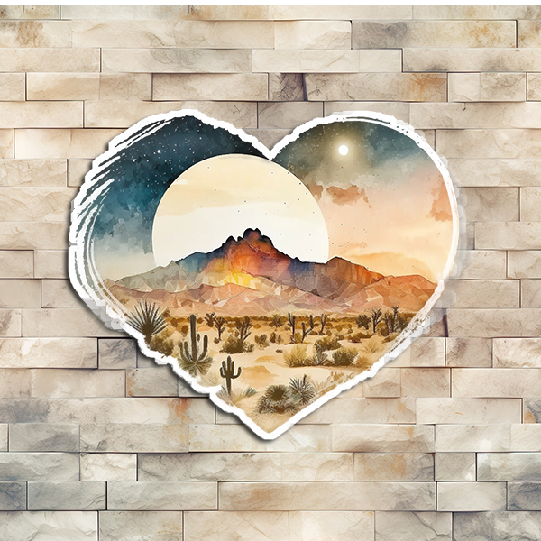 A desert night scene with the moon rising over the distant mountains. This vinyl sticker is in the shape of a heart.