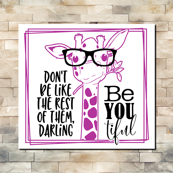 Saying Vinyl Sticker, "Don't Be Like the Rest of Them, Darling Be-You-tiful" with a giraffe eating a plant framed in a pink frame and the giraffe is pick also.